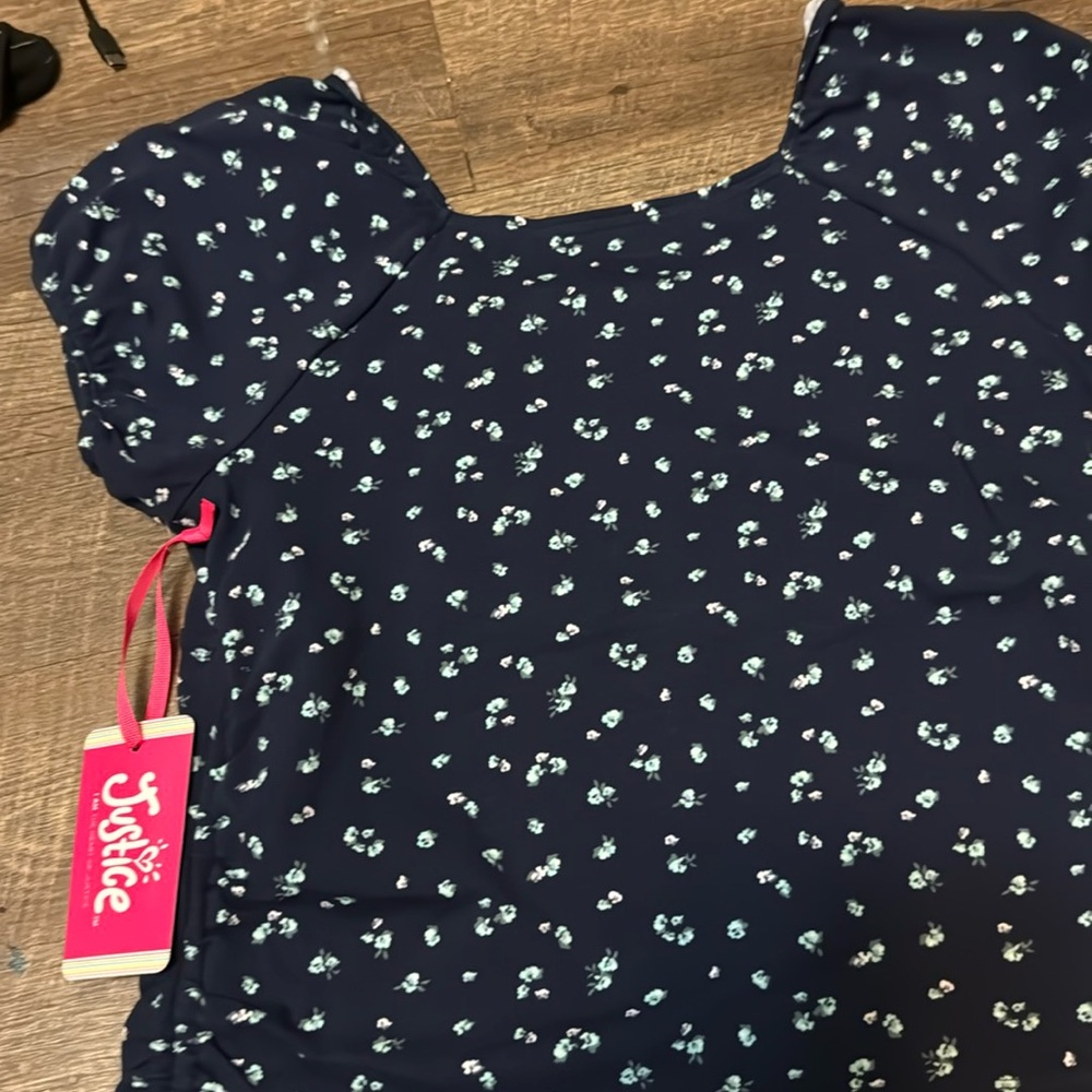 Blue with flowers  and ribbons at end